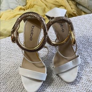 bebe White and Gold Snake Heels